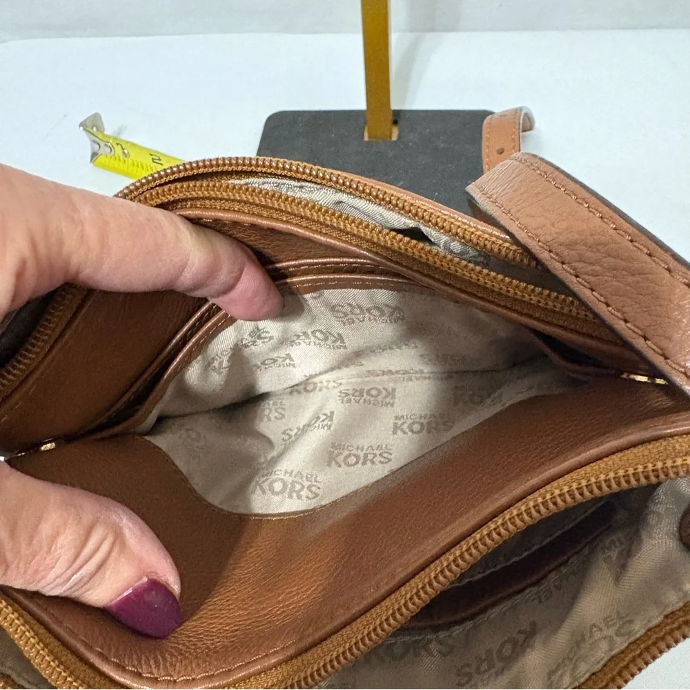 Michael Kors brown leather crossbody bag with gold-tone hardware